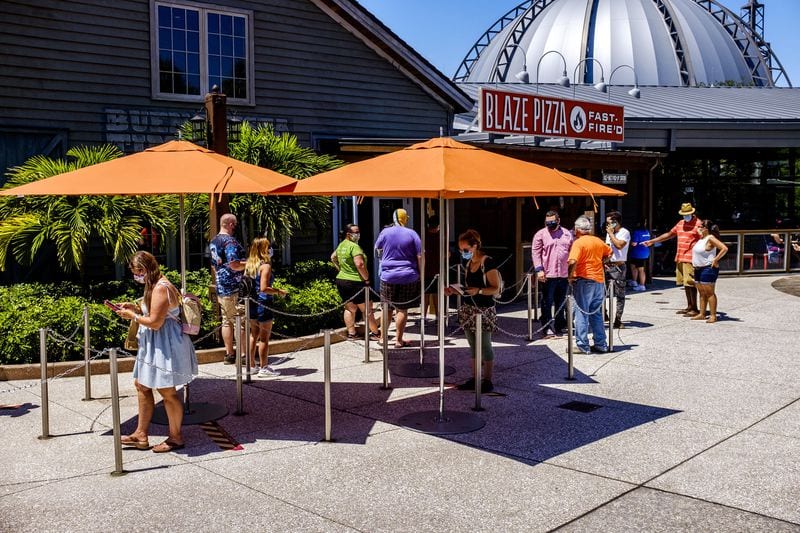 Guests lining up at Disney Springs reopening day [Source: Orlando Sentinel]