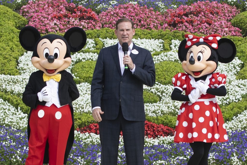 Joe Schott, President and General Manager of Shanghai Disney Resort, with Mickey and Minnie [Source: Disney Parks Blog]