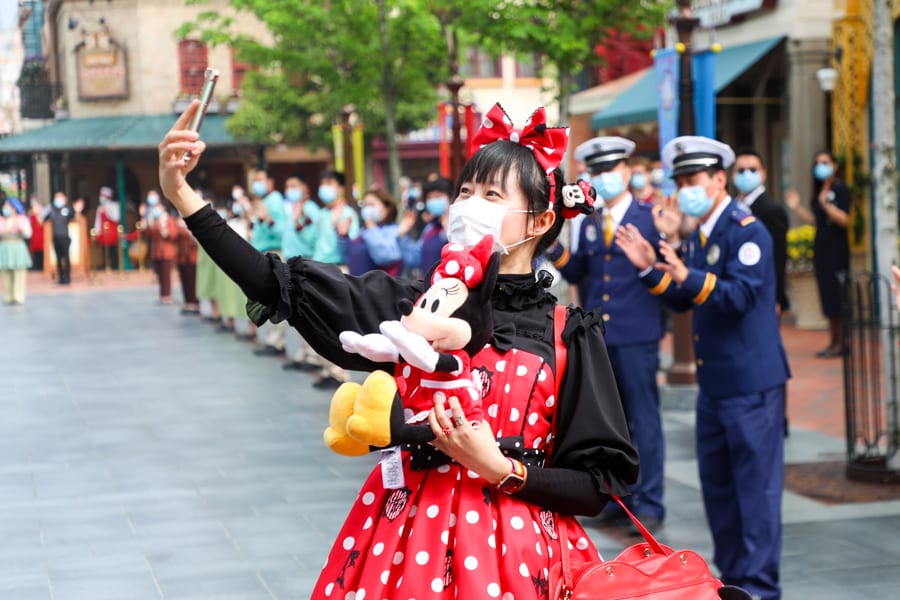 Girl in Minnie Mouse Costume Taking a Selfie [Source: Disney Parks Blog]