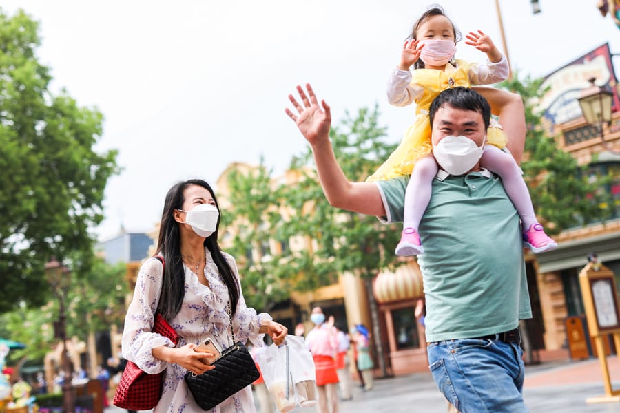 A Family at the Reopening of Shanghai Disneyland [Source: Disney Parks Blog]