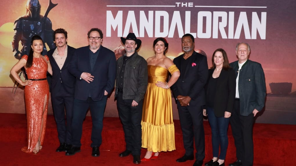 Dave Filoni (4th from Left) with Mandalorian Cast and Crew Members [Source: Mark Von Holden/Invision/AP via CTV News)