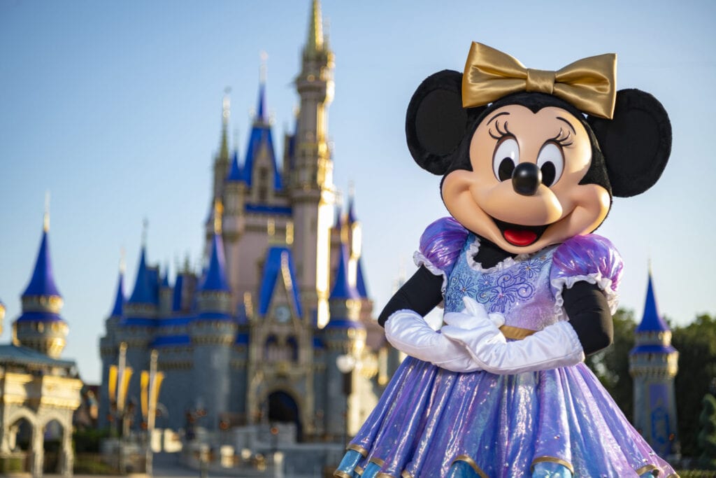 Beginning Oct. 1, 2021, Minnie Mouse will join Mickey Mouse as hosts of “The World’s Most Magical Celebration” honoring Walt Disney World Resort’s 50th anniversary in Lake Buena Vista, Fla. They will dress in sparkling new looks custom made for the 18-month event, highlighted by embroidered impressions of Cinderella Castle on multi-toned, EARidescent fabric punctuated with pops of gold. (Matt Stroshane, photographer)