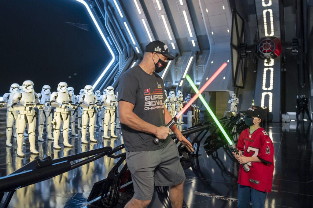 Gronk and His Nephew Dueling With Lightsabers [Source: Disney Parks Blog] 